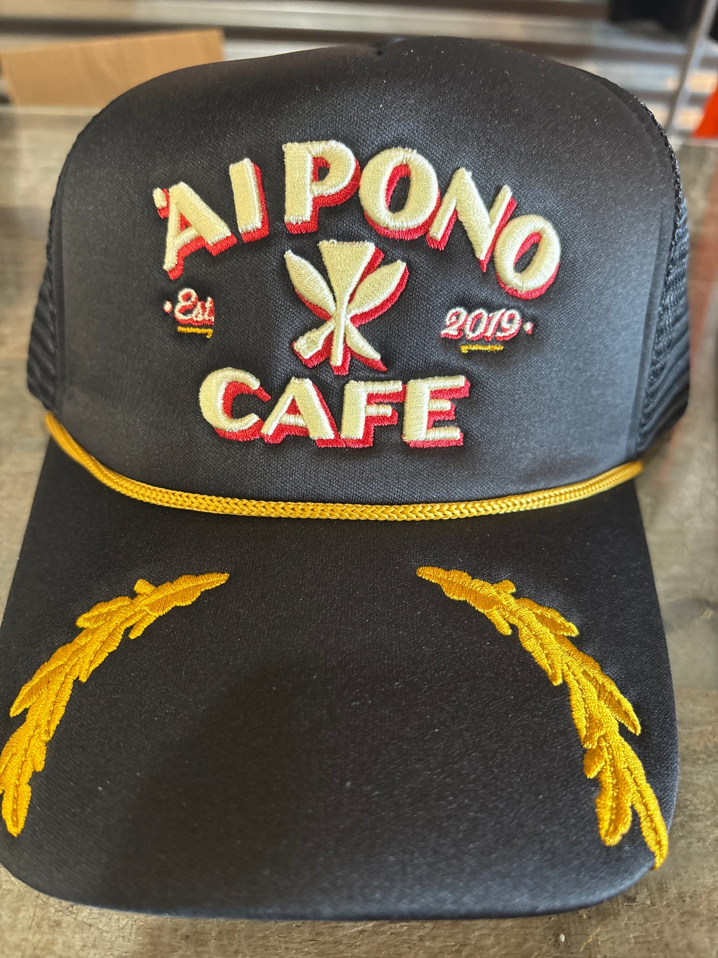 ‘Ai Pono Cafe Trucker Hat