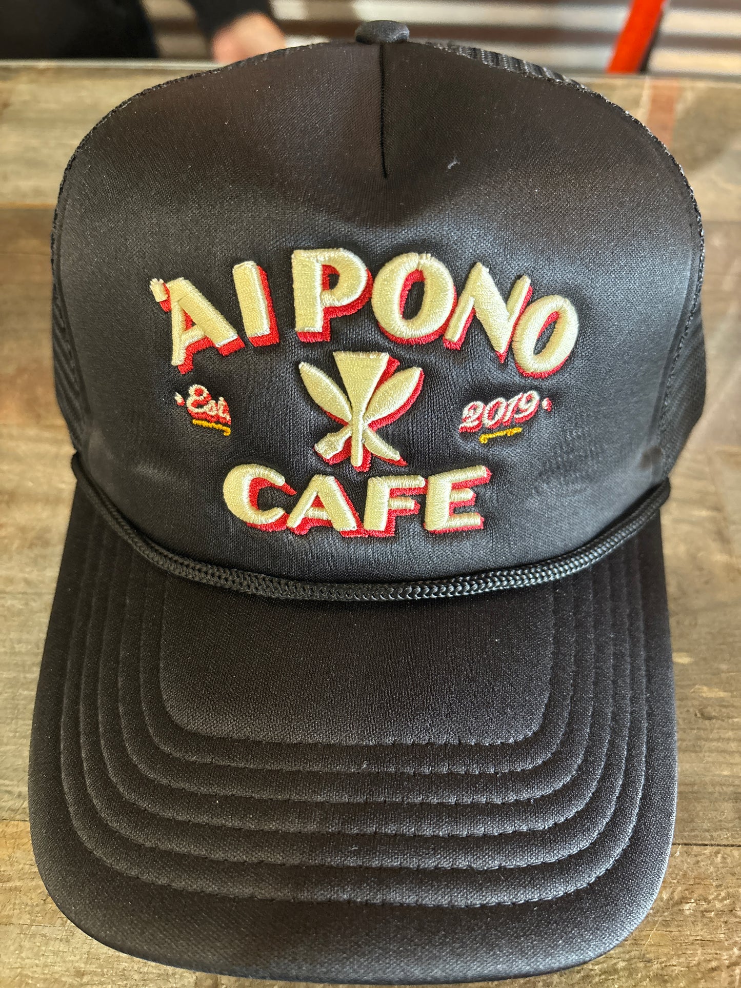 ‘Ai Pono Cafe Trucker Hat